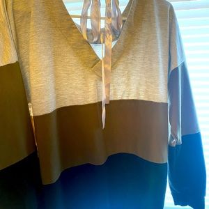 Color blocking sweater with cute tie in back size medium